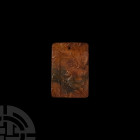 Chinese Calligraphic Plaque. c.19th century A.D. A bifacial rectangular glass pendant or mount, a rearing horse beneath trees and flowers to one face,...