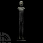 Chinese Standing Stick Figure. 20th century A.D. An unglazed Han style ceramic stick figure of a nude male with hair dressed in a top-knot, sockets to...