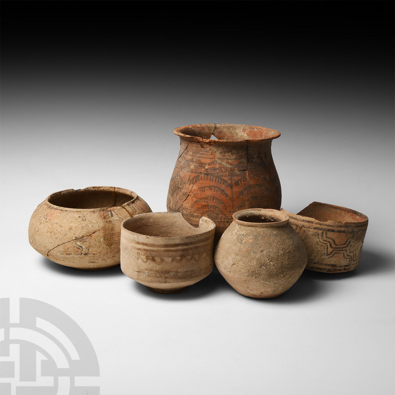 Indus Valley Vessel Group. 4th-2nd millennium B.C. A group of five damaged ceram...