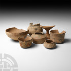 Indus Valley Damaged Vessel Group. 4th-2nd millennium B.C. A group of seven damaged ceramic vessels of various types and sizes including bowls, jars a...