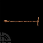 Medieval Bar-Attached Flail. 15th century A.D. An iron fail with chain composed of looped and coiled links and a carinated flail with facetted body an...