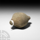 Byzantine 'Greek Fire' Fire Bomb or Hand Grenade. 9th-11th century A.D. A hollow ceramic vessel with piriform body, short neck and domed mouth, band o...