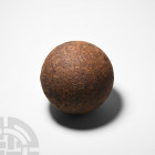 English Civil War Cannon Ball. 17th century A.D. A heavy iron Civil War period cannon ball. 7.6 kg, 12 cm diameter (4 3/4 in.) Found Thames foreshore,...
