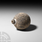 Byzantine 'Greek Fire' Fire Bomb or Hand Grenade. 9th-11th century A.D. A ceramic vessel with a piriform body and domed mouth, ribs and pricked dots t...