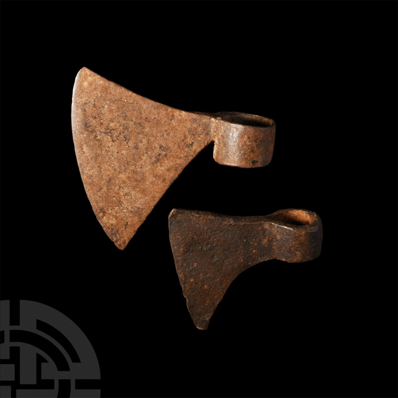 Axehead Collection. 18th-19th century A.D. A group of two iron axeheads, each co...