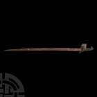 Infantryman's Sword. c.1760 A.D. A British infantryman's sword with swept single-edged steel blade, padded wooden grip, monster-head pommel, folding p...