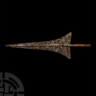 Very Large Parthian Socketted Standard Spearhead. 2nd-3rd century A.D. A massive Parthian or early Sassanian socketted iron spearhead with a triangula...
