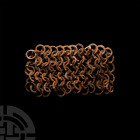 Medieval Chain-Link Armour Section. 11th-15th century A.D. An iron mail fragment formed of big (15mm diameter) rivetted links joined four-in-one, circ...