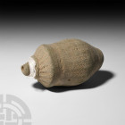 Turco-Mongol 'Greek Fire' Fire Bomb or Hand Grenade. 13th-15th century A.D. A hollow ceramic vessel with cylindrical body, carinated shoulder, short n...