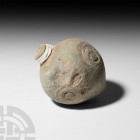 Byzantine 'Greek Fire' Fire Bomb or Hand Grenade. 9th-11th century A.D. A hollow ceramic vessel with piriform body, short neck and domed mouth, band o...