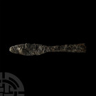 Viking Socketted Spearhead. 9th-11th century A.D. An iron spearhead composed of a short, leaf-shaped blade and tapering, round-section socket, pierced...
