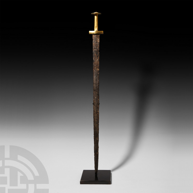 Viking Period Sword with Gold Cross Guard. c.8th-10th century A.D. A sword with ...