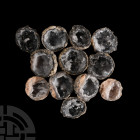 Quartz Crystal Geode Half Group. A group of twelve cut grey quartz geode halves, displaying crystals to the exposed inner surfaces. 465 grams total, 3...