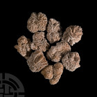Large Desert Rose Cluster Group. A group of ten 'Desert Rose' crystalline gypsum specimens with sand grain inclusions. 800 grams total, 28-70 mm (1 - ...