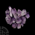 Amethyst Crystal Collection. A group of fourteen amethyst crystals. 202 grams total, 24-52 mm (1 - 2 in.) From Brazil. Mineral Imports, London, UK. Gr...