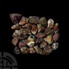 Peacock Ore Specimen Group. A group of thirty peacock ore specimens with orange and purple iridescence. 925 grams total, 30-53 mm (1 1/4 - 2 in.) Mine...