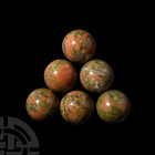 Polished Unakite Mineral Sphere Group. A group of six polished unakite spheres. 605 grams total, 40 mm each (1 1/2 in.) Mineral Imports, London, UK. G...
