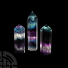 Fluorite Obelisk Group. A group of three cut and polished fluorite obelisks; held in a white card collector's tray. 91 grams total, 46-64 mm (1 3/4 - ...