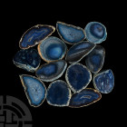 Polished Agate Geode Half Group. A group of thirteen cut and polished blue agate geode halves; colour enhanced. 2.57 kg total, 61-96 mm (2 1/2 - 3 3/4...