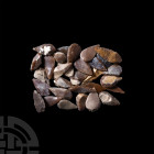Stone Age Knapped Flint Arrowhead Collection. Neolithic, 8th-5th millennium B.C. A group of fifty knapped flint arrowheads. 46 grams total, 21-32 mm (...