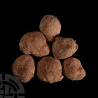 Unopened Crystal and Agate Geode Group. A group of six unopened agate geodes, each roughly spherical or oval in shape. 765 grams total, 53-69 mm (2 - ...