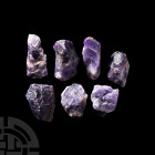 Amethyst Crystal Chunk Group. A group of seven amethyst crystal chunks of irregular form. 965 grams total, 57-87 mm (2 1/4 - 3 1/2 in.) Mineral Import...