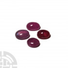 27.85 Carat Polished Ruby Cabochon Group. A group of four polished ruby cabochons, totalling 27.85 carats. 5.57 grams total, 11-12 mm (3 /8 in.) Acqui...