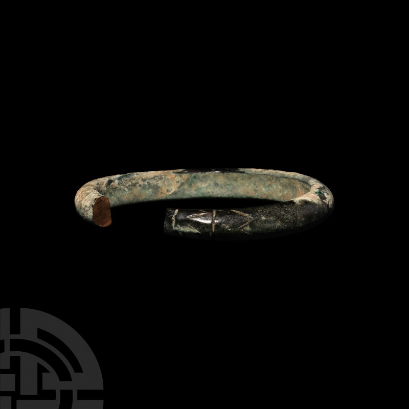 Bronze Age Bracelet. 2nd-1st millennium B.C. A penannular bronze bracelet with D...