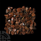 100 Brown Obsidian Mineral Specimens. A group of one hundred brown obsidian mineral specimens. 1 kg total, 30-47 mm (1 1/4 - 1 3/4 in.) Mineral Import...