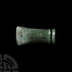 Bronze Age Socketted Axehead. 2nd millennium B.C. A socketted bronze axehead with tapering body, tear-shaped void to one face. 172 grams, 89 mm (3 1/2...