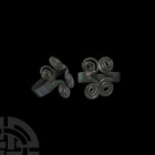 Bronze Age Ring with Coils. Mid 2nd-mid 1st millennium B.C. A bronze spiral ring with open double end terminals and a flat circular-section band. Cf. ...