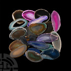 20 Polished Agate Geode Slices. A group of twenty polished agate slices; colour enhanced. 365 grams total, 52-84 mm (2 - 3 1/4 in.) Mineral Imports, L...