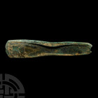 Very Large Bronze Age Palstave Axehead. c.15th-10th century B.C. A large bronze palstave axehead with waisted profile, convex cutting edge and wings t...