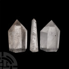 Clear Quartz Crystal Obelisk Group. A group of three cut and polished clear quartz crystal pieces comprising one obelisk and two broad points. 385 gra...