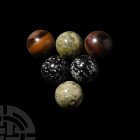 Polished Mineral Sphere Group. A group of six polished mineral spheres comprising: two tiger's eye spheres; two of snowflake obsidian; two unakite sph...