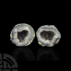 Cut and Polished Amethyst Crystal Geode Pair. A pair of cut and polished amethyst geode halves, displaying crystals to the exposed inner surfaces. 1.2...