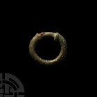 Iron Age Celtic Terret Ring. 1st century B.C.-1st century A.D. A Celtic or early Roman terret ring with lentoid-section body, two collars and constric...