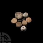 Viking Weight Collection. 9th-12th century A.D. A mixed group of lead weights of various shapes and sizes, including one example with a cross or quatr...