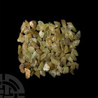 Green Calcite Mineral Specimen Group. A group of over one hundred green calcite mineral specimens. 935 grams total, 16-45 mm (5/8 - 1 3/4 in.) Mineral...