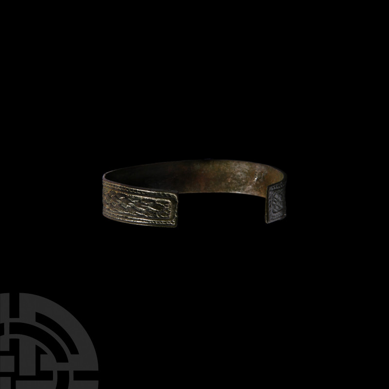 Viking Age Bracelet with Interlace. 9th-12th century A.D. A penannular bronze br...