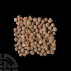 100 Desert Rose Cluster Specimens. A group of one hundred 'Desert Rose' crystalline gypsum specimens with sand grain inclusions, mostly of single sphe...