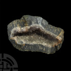 Large Amethyst Crystal Cave Section. A large amethyst crystal cave section displaying crystals to the exposed inner surfaces. 5.45 kg, 26 cm (10 1/4 i...