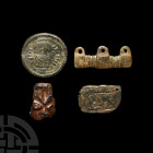 Anglo-Saxon Artefact Collection. c.6th-9th century A.D. A mixed group of bronze artefacts comprising: a sub-rectangular plaque bearing a geometric zoo...