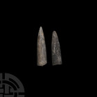British Fossil Belemnite Pair. Jurassic Period, c.190 million years B.P. A pair of fossil belemnite guards. 50.9 grams total, 61-68 mm (2 3/8 - 2 5/8 ...