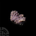 Grape Agate Mineral Specimen. A specimen of small grape agate crystals in dark purple colour. 256 grams, 10 cm (4 in.) From the island of Sulawesi, In...