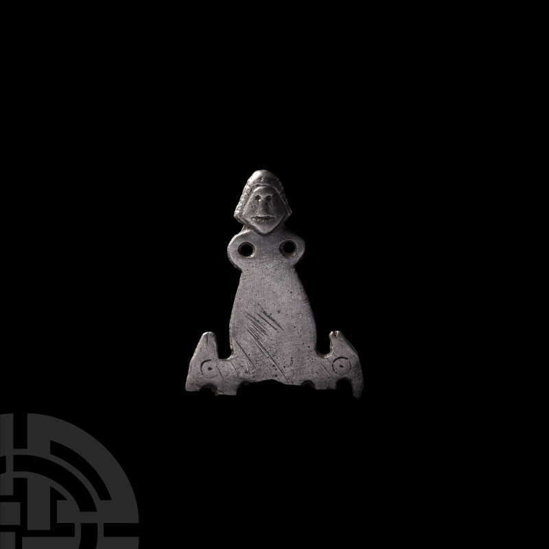 Viking Age Zoomorphic Figural Mount. 9th-12th century A.D. A flat-section mount ...