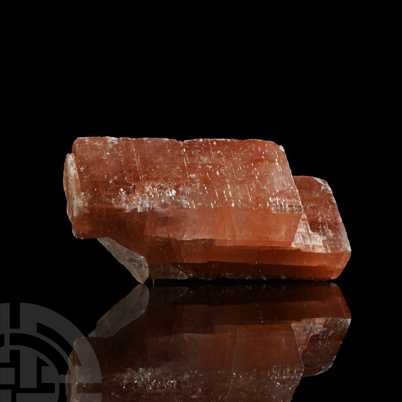 Large Red Calcite Crystal Specimen. A large red calcite specimen with waxy lustr...