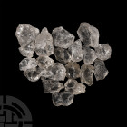 20 Clear Quartz Crystal Chunks. A group of twenty clear quartz crystal chunks. 1 kg total, 38-62 mm (1 1/2 - 2 1/2 in.) From Brazil. Mineral Imports, ...