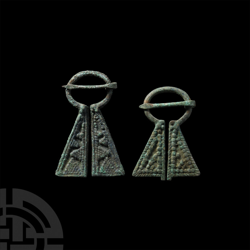 Viking Inspired Omega Brooch Pair. 12th-15th century A.D. A pair of bronze Mordv...