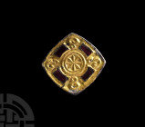 Merovingian Silver-Gilt Square Brooch with Garnets. 6th-7th century A.D. A rectangular silver-gilt plate brooch with slightly bowed edges, raised rim ...